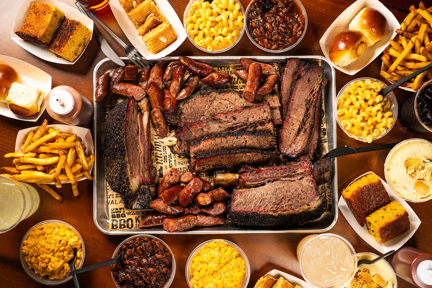 Texas BBQ tray with brisket, sausage, and sides